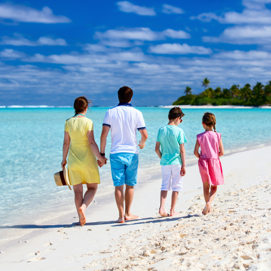 Family enjoying the beach - Web Design & SEO Innisfail